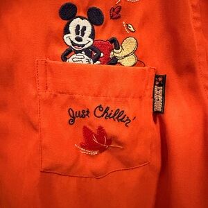 Disney “just chillin” Orange Mickey Mouse shirt